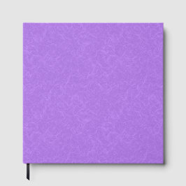 Purple textured surface with swirling pattern gästböcker