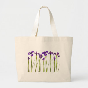 Purpurfärgade irises som isoleras på en jumbo tygkasse