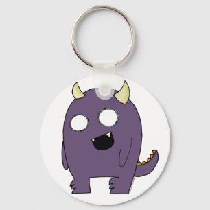 Purpurfärgat monster nyckelring