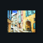 Quaint Old Cobblestone Street Canvastryck<br><div class="desc">En kullerstensgata med byggnad som är gjord av sandsten med bågstrutsar och träschuttrar ge den en gammal världscharm med sina smala gator och kontrasterar blått och brunt färg ge en känsla av värme och vänlighet. En charmerande bild i bild.</div>