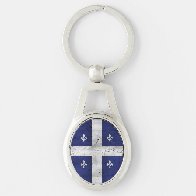 Québecs flagga i grunge stil eroderad ovalt silverfärgad nyckelring (Framsidan)