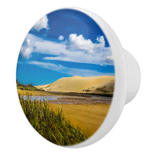 Quicksand stream nära 90-Mile Beach, Nya Zeeland Knopp