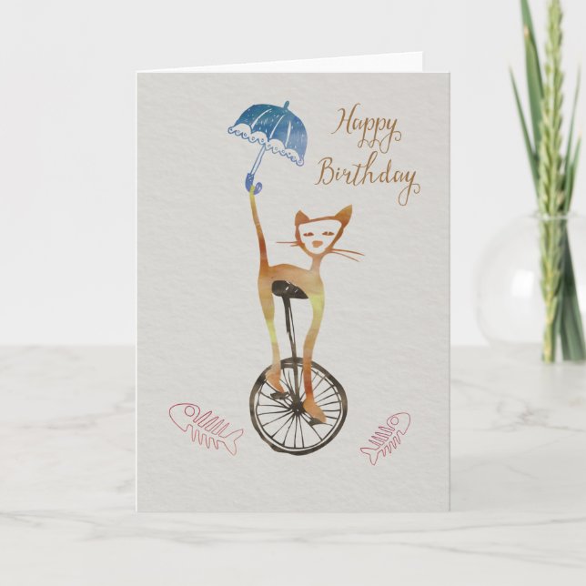 Quirky-katt på ett unicykelfödelsekort kort (Framsida)