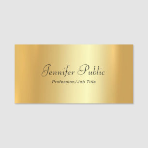 Räcka skrivar text den moderna eleganta guld- namnbricka