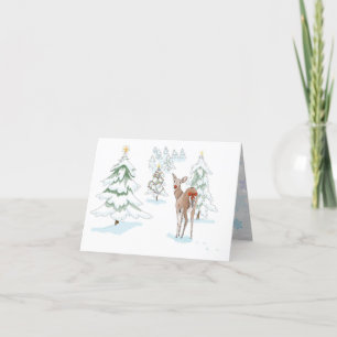 Rådjur i den snöiga skogen med röd näsa helgkort