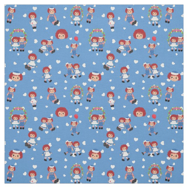 Raggedy Ann och Andy på fallande hjärtan på blått Tyg (Provkarta)
