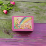Rainbow Garden<br><div class="desc">En regnbåge slutar i en underbar pastellblomsterträdgård med ditt namn.</div>