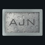 Raindrops Monogrammed Bälte Buckle<br><div class="desc">Anpassa den här bälte-låsbeslaget med monogrammet genom att ändra initialer till kostym efter dina behov. Designen kommer från originalteckningen.</div>