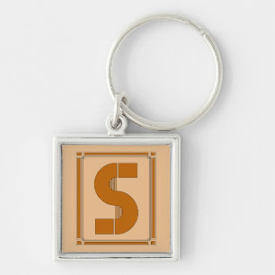 Raksträckan fodrar art déco med monogramen, brev fyrkantig silverfärgad nyckelring