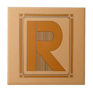 Raksträckan fodrar art déco med monogramen, brev kakelplatta