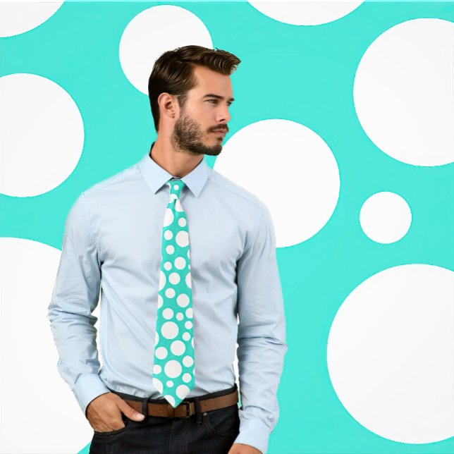 Random White Polka Dot Mönster om Turquise Tie Slips (Man wears necktie with white polka dots on turquoise blue.  Background matches tie.)
