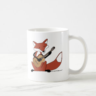 Räv som leker gitarren kaffemugg