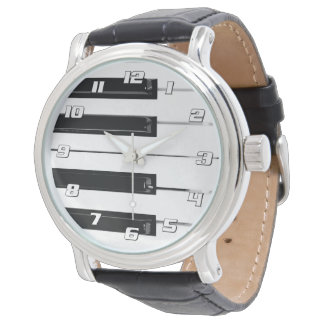 Realistiska svarta vita pianotangentbordstangenter armbandsur
