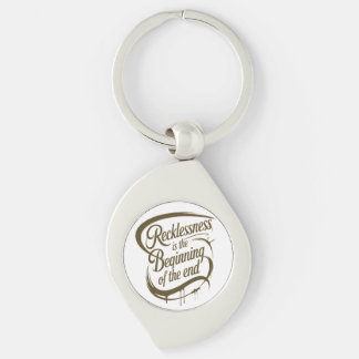 Recklessness Is the Beginning of the End Swirl Silverfärgad Nyckelring