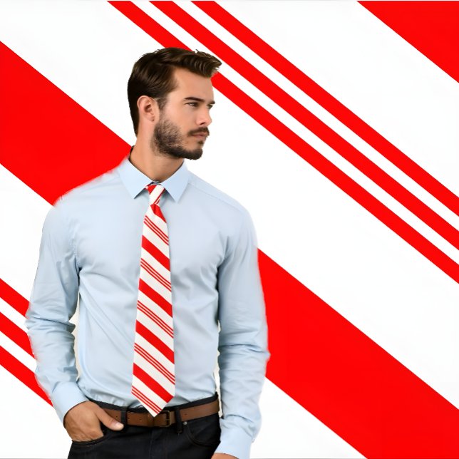 Red and White Candy cane Tie Slips (Man wears a candy cane striped, red and white, necktie. He stands against candy stripe background.)
