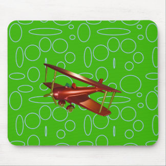 Red Bi-flygplan på Grönt Circles and Loops Musmatta