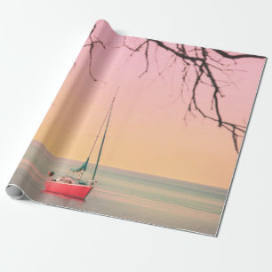 RED BOAT ON BEACH UNDER SUNSET PRESENTPAPPER