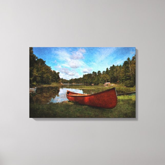 Red canoe på sjö-banken canvastryck (Framsida)