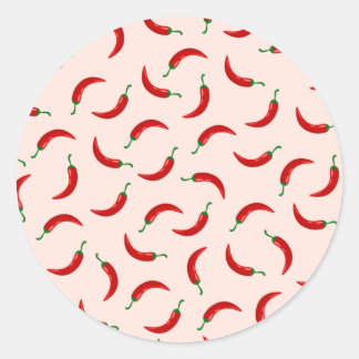 Red chili paprika på ljusa färgadens bakgrund runt klistermärke