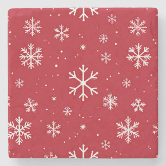 Red coaster with white snowflake pattern stenunderlägg