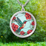 Red Flower Hummingbird Silverpläterat Halsband<br><div class="desc">På det här söt halsbandet är en förbluffande bild av en hummerfågel bredvid en grupp röda blommor. Färg i den hummerande fågeln är blå grönt och röd, vilket kompletterar blomman bilder och den ljusa himlar blå bakgrunden. Elegant, ljus och färglös! Se till att se motsvarande öronringar och nyckelring i vår...</div>