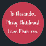 Red God jul från Mamma-presentdekal för märkre Runt Klistermärke<br><div class="desc">Röd julklämma med märkrn God jul Kärlek Mamma xxx i vit typografi/ skript. Byt helt enkelt ut namn Alexander till din kära i textrutan för personlig anpassning. Vill du göra fler ändringar? Hela texten kan vara personlig. Eller om du vill ändra färg klickar du bara på designen verktyg och markerar...</div>