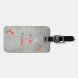 Red graffiti name on gray concrete, your  bagagebricka