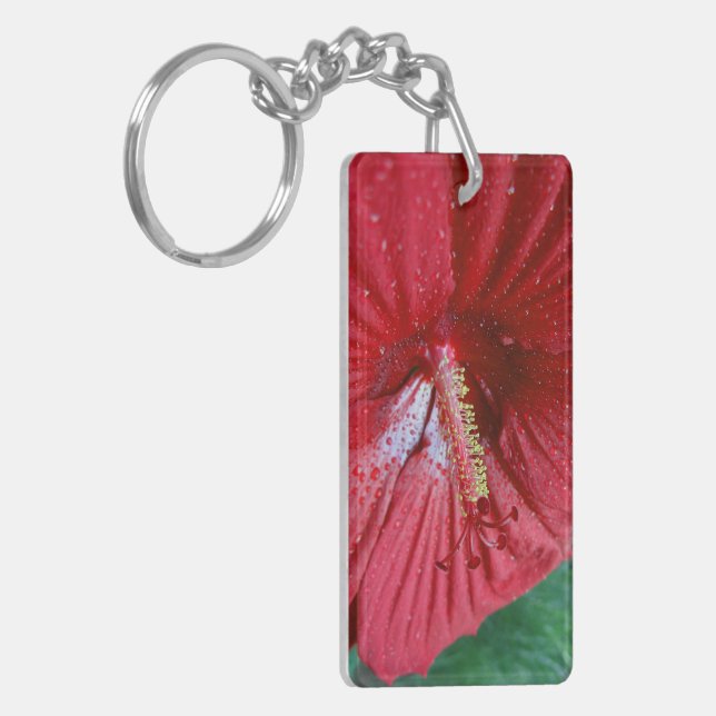 Red Hibiscus Flower med Raindros Photo (Vänstra Framsidan)