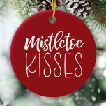 Red Mistletoe Kisses Newlaps Photo jul Julgransprydnad Keramik<br><div class="desc">Jul önskemål och mistletoe kysser! Det är julen! Den här beundransvärda röda och vita prydnaden kommer säkert att göra helgdag glad! Lägg till ett foto och namnen på baksidan av dekorationen. Underbar för nylweds! Ställe på träd för lite extra charm. Designad av Blackberry Boulevard.</div>