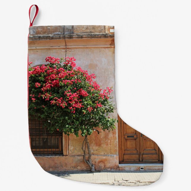 RED PETAL FLOWWER PÅ KONCRETE WALL LITEN JULSTRUMPA (Framsidan)