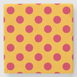 Red polka dots på gult stenunderlägg