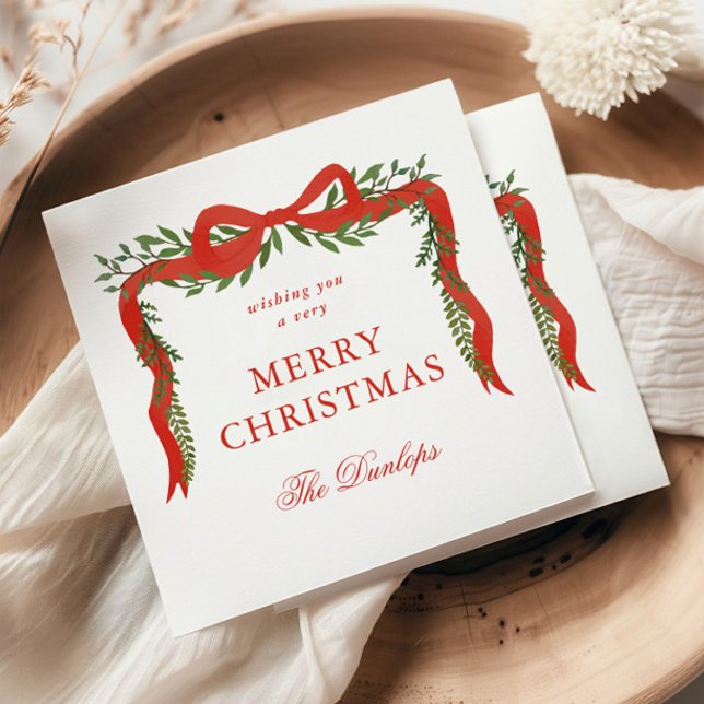 Red Ribbon Bow Greenery jul Party Pappersservett (Elegant red ribbon with bow and greenery Christmas holiday party napkins.)