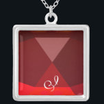Red Ruby Gem Monogram Silverpläterat Halsband<br><div class="desc">Elegant och unik design med gemstone. Mycket exakt modellering och rendering i 3D Studio Max av Bulgan Lumini .Part från serien Hyper Talismans.</div>