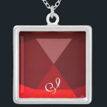 Red Ruby Gem Monogram Silverpläterat Halsband<br><div class="desc">Elegant och unik design med gemstone. Mycket exakt modellering och rendering i 3D Studio Max av Bulgan Lumini .Part från serien Hyper Talismans.</div>