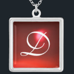Red Ruby Gem Monogram Silverpläterat Halsband<br><div class="desc">Elegant och unik design med gemstone. Mycket exakt modellering och rendering i 3D Studio Max av Bulgan Lumini .Part från serien Hyper Talismans.</div>