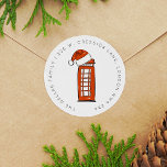 Red Santa Hat London Telefonbox-Returadress Runt Klistermärke<br><div class="desc">Viktiga returetiketter med en telefonkatalog i London som fylls med en jultomt som speciell festiv beröring. Adress kretsar runt bilden i ett modernt,  lekfullt teckensnitt. Gör att du får lycklig julhelgar hela säsongen! Originalkonst och design av Annie Montgomery Design.</div>