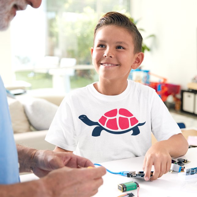 Red Snäcka Tortoise T Shirt (Boy smiling at his dad, wearing turtle tshirt)