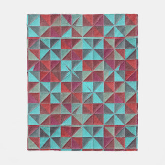 red, teal, purple, and gray quilt fleecefilt