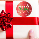 Red White Festive Ljus och Snöflingor jul Runt Klistermärke<br><div class="desc">Det här är ett sjudande julklistermärke som är designat för att ge dina helgdag en personlig beröring. Den har en vacker övertoningsbakgrund. Bakgrunden är försedd med delikat vitt snöflingor och färglöst ljus, med ett streck av helgdag cheer. Ord "God jul" är elegant skrivet i vitt och grönt och står ut...</div>