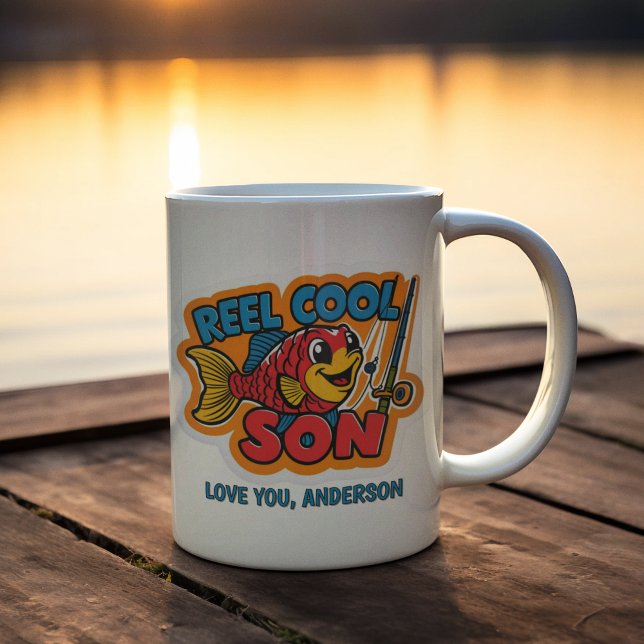Reel Coola Son Mugg (Let your son know how cool he is with this, "Reel Cool Son" fishing mug! )