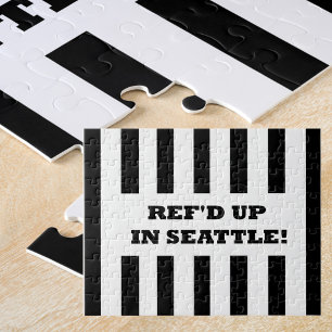 Ref var på plats i Seattle med ersättningsbidrag Pussel