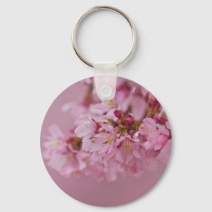 Reflektioner kring Blek Rosa av Sakura Cherry Blom Nyckelring