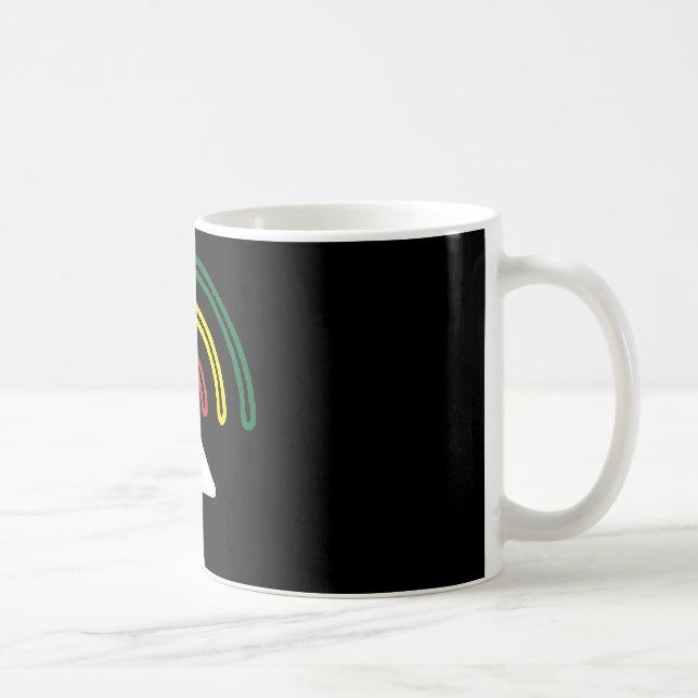 Reggaen lyssnar muggen kaffemugg (Höger)