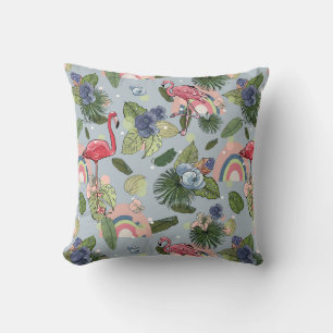 regnbågar och rosa flamingos i tropiska löv och kudde