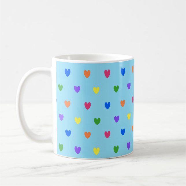 Regnbågdykarhjärtan på baby blue kaffemugg (Vänster)