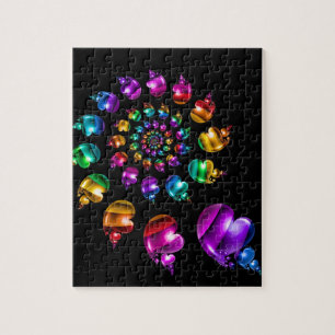 Regnbågehjärta rullar på svart pussel