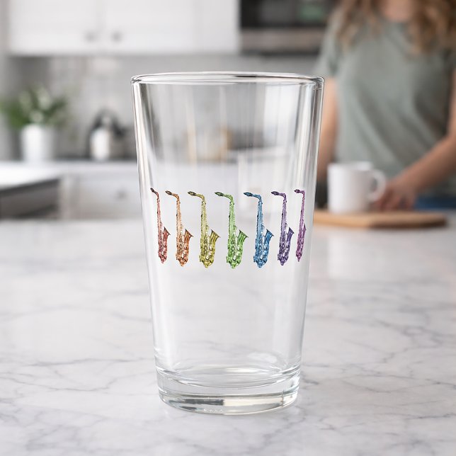 Regnbågssaxofoner Musik Färgrik Glaskopp (A glass with a rainbow lineup of saxophones.)