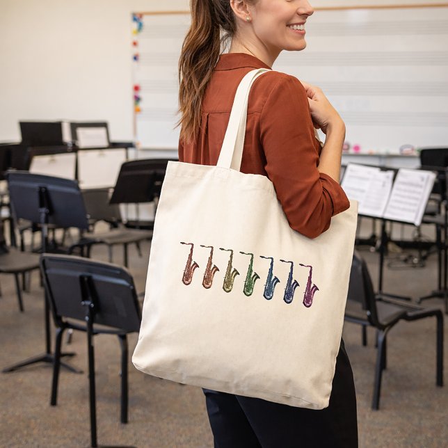 Regnbågstentor saxofoner tygkasse (A tote bag with a fun rainbow saxophone design.)