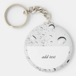 Regndroppar i glas nyckelring