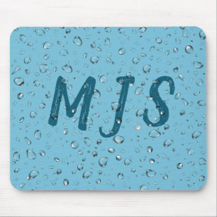 Regndroppar och monogram musmatta